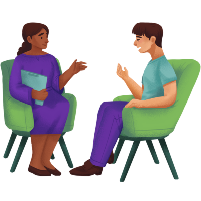 Two people sitting in green chairs, talking in a therapy session.